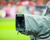 TV Camera Close Up at Football Stadium