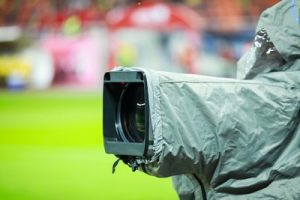 TV Camera Close Up at Football Stadium